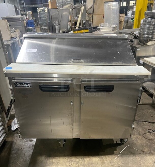 Leader Commercial Refrigerated Mega Top Sandwich Prep Table! With 2 Door Underneath Storage Space! With Commercial Cutting Board! All Stainless Steel! On Casters! MODEL ESLM48SC SN: NP12M0801D 115V 1PH - Item #1116968
