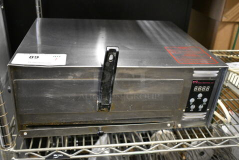 Wisco 425C Stainless Steel Commercial Countertop Electric Powered Snack Oven. 120 Volts, 1 Phase. 