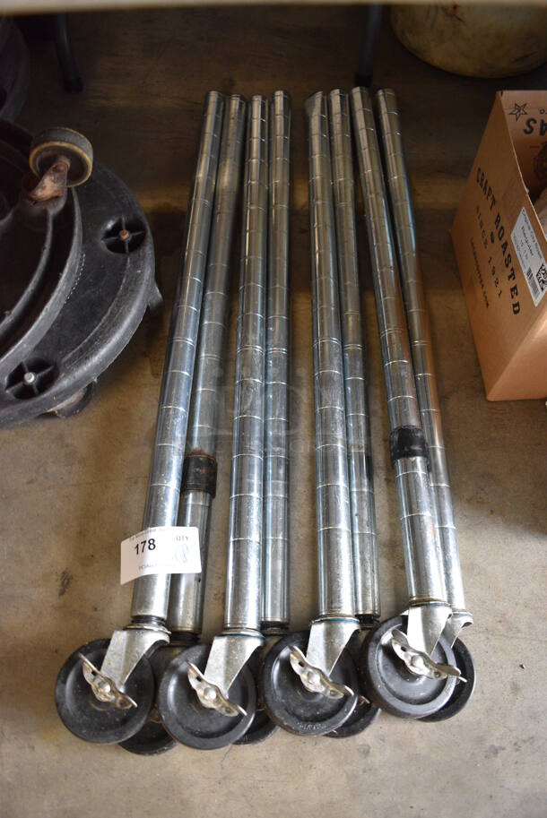 ALL ONE MONEY! Lot of 8 Chrome Finish Poles on Casters. 39"