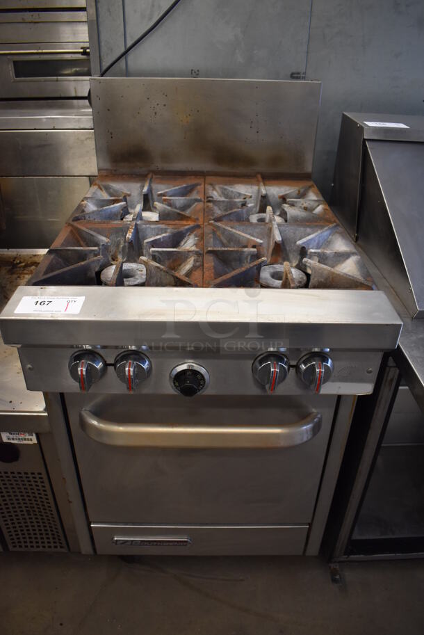 Southbend S24E Stainless Steel Commercial Natural Gas Powered 4 Burner Range w/ Oven and Back Splash on Commercial Casters. 24.5x34x47