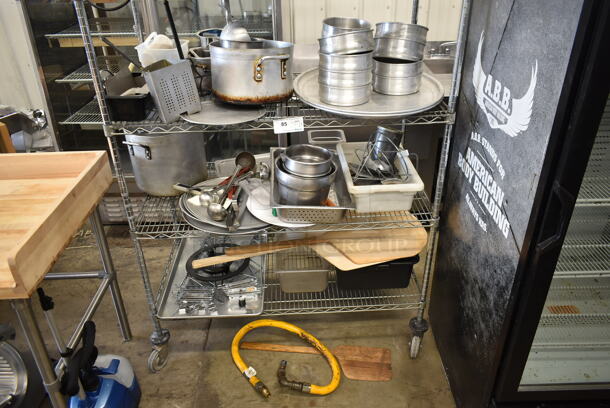ALL ONE MONEY! Three Tier Lot of Various Items Including Round Metal Baking Pans, Stock Pot and Wooden Pizza Peels