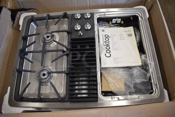 BRAND NEW SCRATCH AND DENT! GE PGP900SENSS Stainless Steel 4 Burner Gas Downdraft Cooktop. 