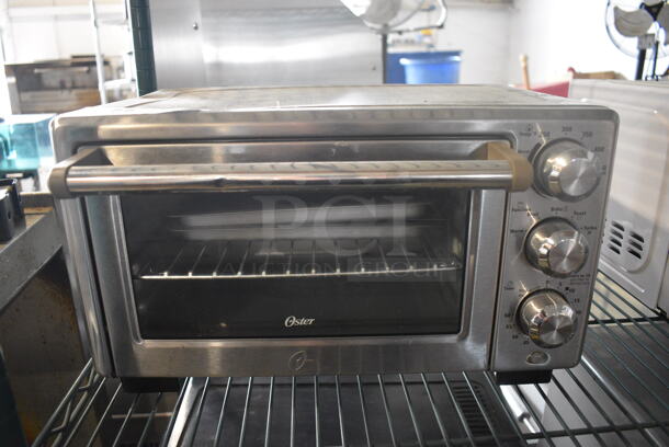 Oster Stainless Steel Countertop Toaster Oven. 16.5x13x10