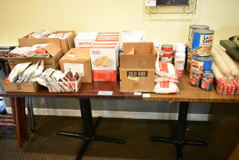 2 Wood Pattern Table w/ Contents Including Muffin Mix, Chow Mein Noodles. 44x30x30, 30x30x30. 2 Times Your Bid! (main dining room)