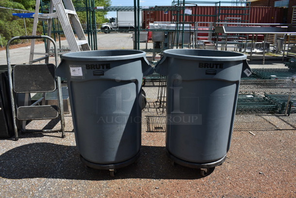 2 Rubbermaid Brute Gray Poly Trash Cans on Trash Dolly. 26x22x33. 2 Times Your Bid!
