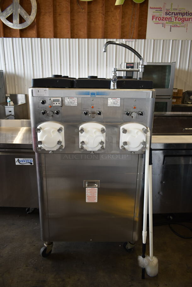 2018 Taylor C043-33 Stainless Steel Commercial Floor Style Water Cooled 3 Flavor Continuous Dispensing Frozen Custard Machine / Batch Freezer on Commercial Casters. Comes w/ 3 Taylor RC35N-33 Compressors. 115/208/230 Volts, 3 Phase.