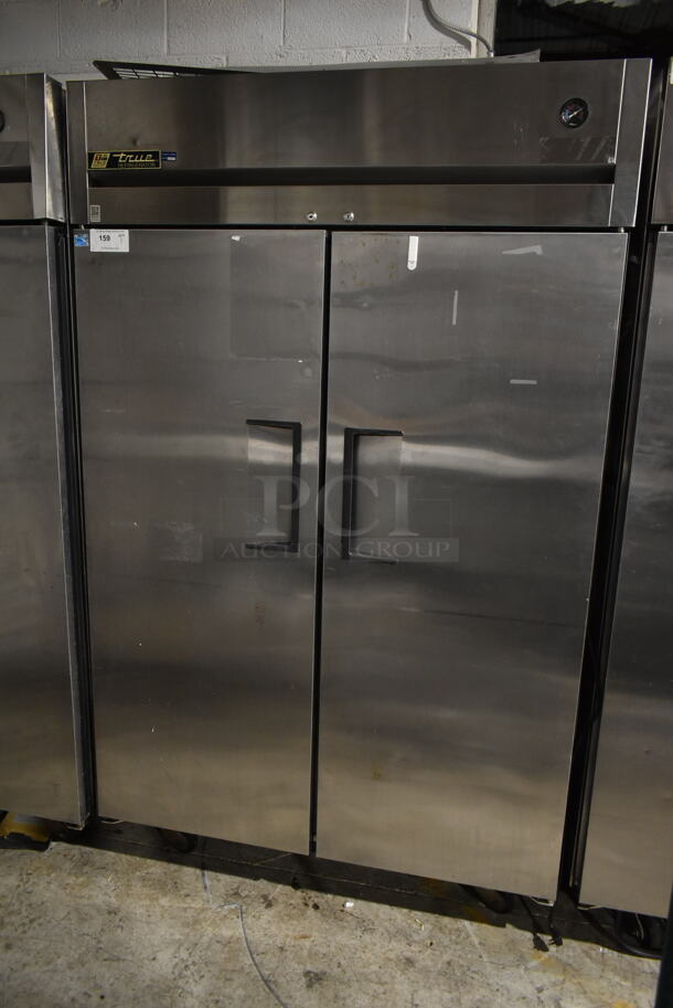 2012 True TG2R-2S ENERGY STAR Stainless Steel Commercial 2 Door Reach In Cooler w/ Poly Coated Racks on Commercial Casters. 115 Volts, 1 Phase. Tested and Working!