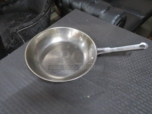 One Stainless Steel Emeril 10 Inch Saute Pan. 
