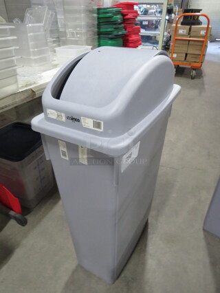 One Winco 23 Gallon Trash Can With Swing Top Lid.