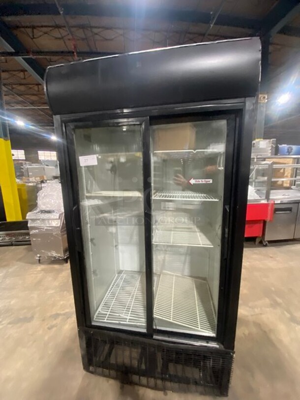 True Commercial 2 Sliding Door Reach In Refrigerator Merchandiser! With View Through Doors! With Poly Coated Racks! Model: GDM33 SN: 13089041 115V 60HZ 1 Phase