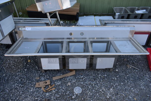 BRAND NEW SCRATCH AND DENT! Regency 600S31620218 Stainless Steel Commercial 3 Bay Sink w/ Dual Drain Boards. No Legs. Bays 16x20. Drain Boards 16.5x22