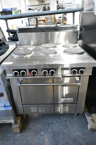 BRAND NEW SCRATCH AND DENT! 2024 Garland SS686 Stainless Steel Commercial Floor Style Electric Powered 6 French Burner Range w/ Oven. 208 Volts, 1/3 Phase. 