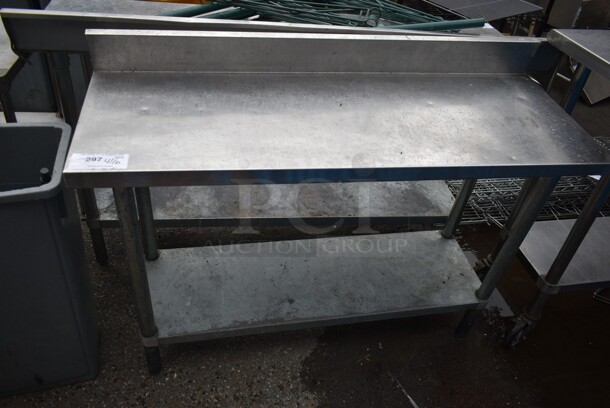Stainless Steel Commercial Table w/ Back Splash and Metal Under Shelf. 