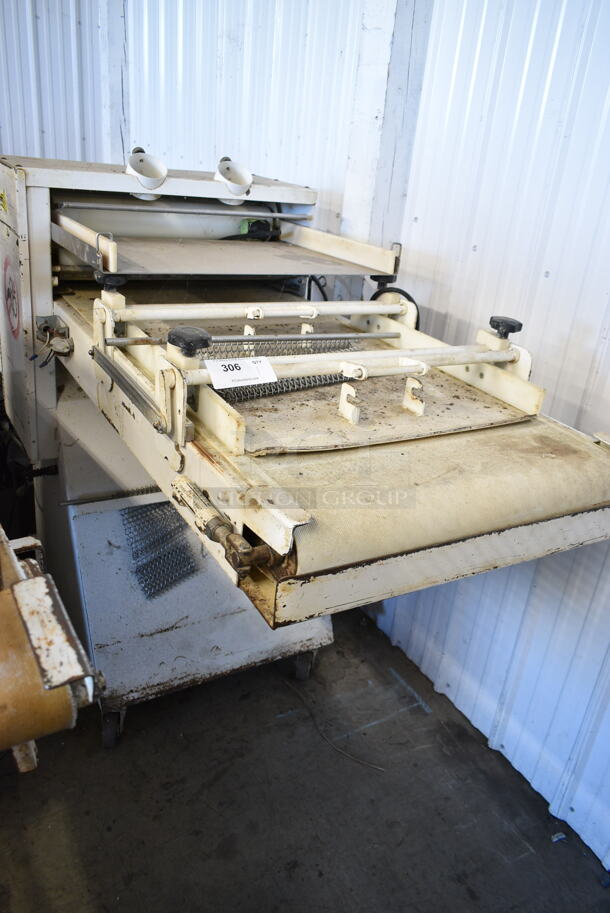 Metal Commercial Floor Style Dough Sheeter on Commercial Casters. Cannot Test Due To Plug Style - Item #1117949