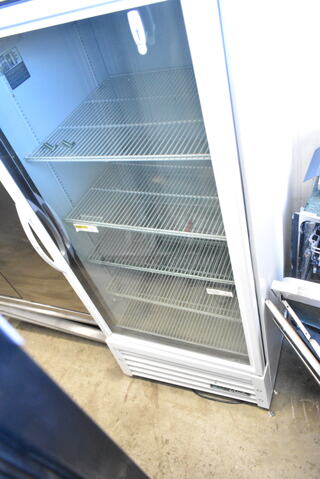 2021 True TSCI-600R-G-PH Metal Commercial Single Door Reach In Cooler Merchandiser w/ Poly Coated Racks. 115 Volts, 1 Phase.