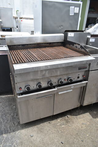 Garland Stainless Steel Commercial Natural Gas Powered Charbroiler Grill on 2 Door Equipment Stand.