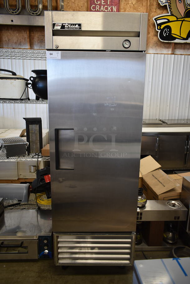 True T-23 Stainless Steel Commercial Single Door Reach In Cooler w/ Poly Coated Racks on Commercial Casters. 115 Volts, 1 Phase. Tested and Powers On But Does Not Get Cold