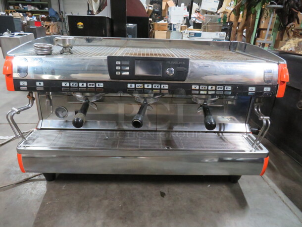 One Nuova Simmoneli Aurelia II Stainless Steel 3 Group Espresso Machine With 4 Portafillers, And 2 Steam Wands. 208-240 Volt. 41X25X25