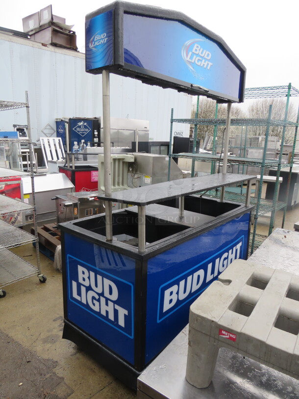 One Portable Bud Light Outdoor Beverage Merchandiser With Under Storage On Casters.