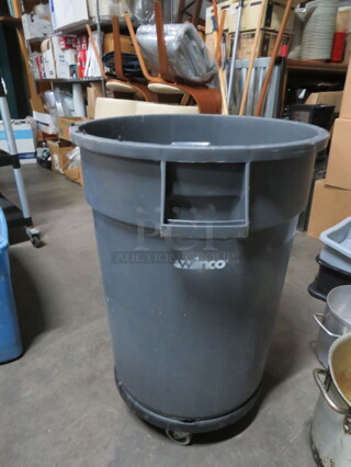 One Winco 32 Gallon Trash Can On A Dolly.