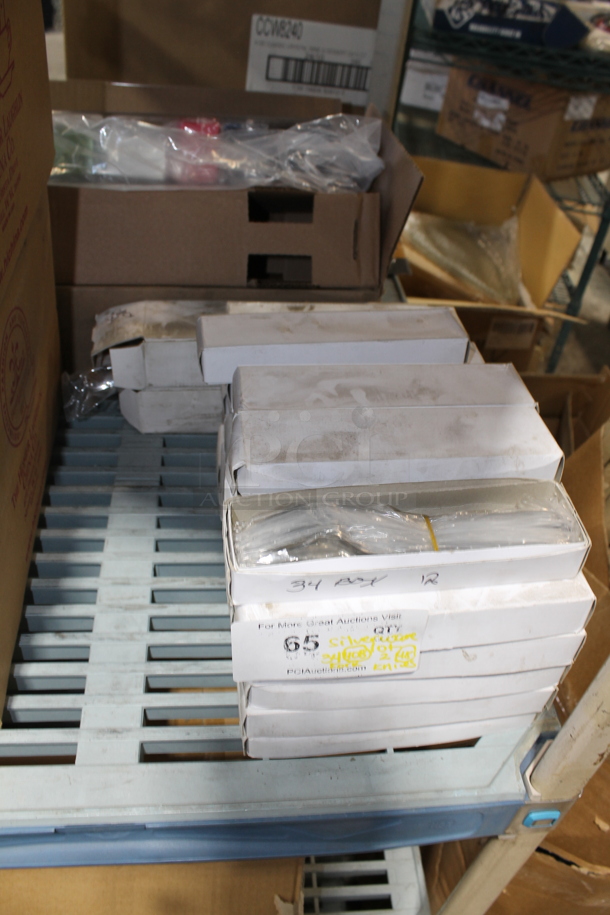 36 Boxes of BRAND NEW Silverware; 34 Boxes of 12 Capco Heavy Embassy Dessert Forks and 2 Boxes of 24 Donizetti T022KPTF Table Knives. 36 Times Your Bid!