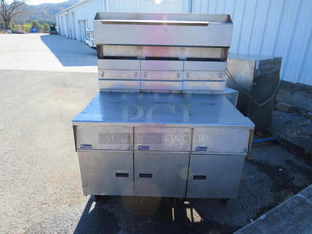 One Pitco Natural Gas Triple Deep Fryer On Casters. Model# SG14. 47X34.5X61