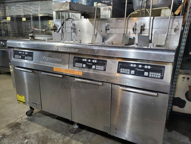 Frymaster FFMPH355BLSC Natural Gas 3 Bay Fryer with Dump Station, On casters. It is clean and ready to go! 66X33X38 - Item #1125861