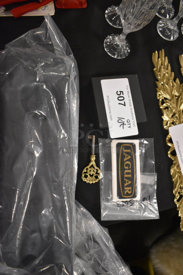 ALL ONE MONEY! Jaguar Stickers, Gold Colored Key, Aston Martin License Plate Holder, and Lamborghini Cuff Links with Box