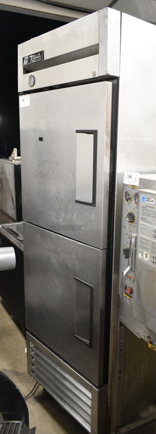 True T-23F-2 Stainless Steel Commercial 2 Half Size Reach In Freezer on Commercial Casters. 115 Volts, 1 Phase. 