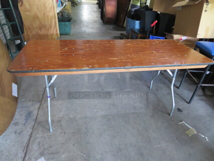 One Wooden Folding Table. 72X30X30