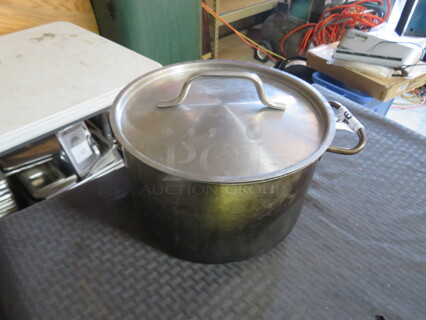 One Stainless Steel Stock Pot With Lid.