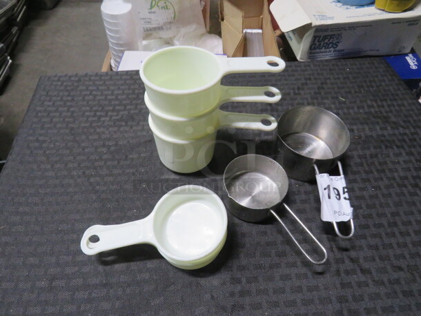 One Lot Of Assorted Measuring Cups.