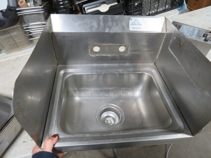 One Advance Tabco Stainless Steel Sink With R/L And Back Splash. 17X15