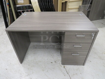 One Gray Desk With 3 Drawers With Key. 47X30X29.5