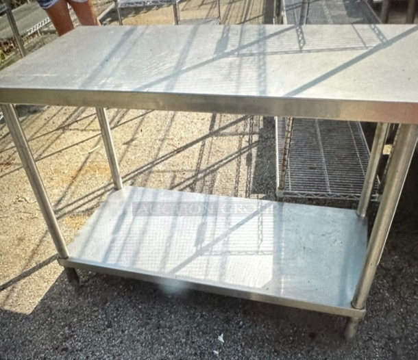 One Stainless Steel Table With Stainless Under Shelf. 48X24X35