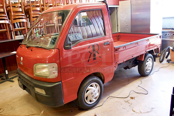 WORK HORSE! 1999/2000 Diahatsu Hijet S210P Pick-Up/Flatbed Truck. 64875Km / 40311 Miles - Runs Perfectly! 5-Speed Manual Transmission, 4 Wheel Drive, 600CC 3 Cylinder, Fuel Injected, Bed Converts From Pick-Up Truck To Flat Bed. Includes Spare Tire. Minor Rust On Flat Bed Panels - Driver side mirror needs to be re-attached. Includes All Original Paperwork. Made In Japan.