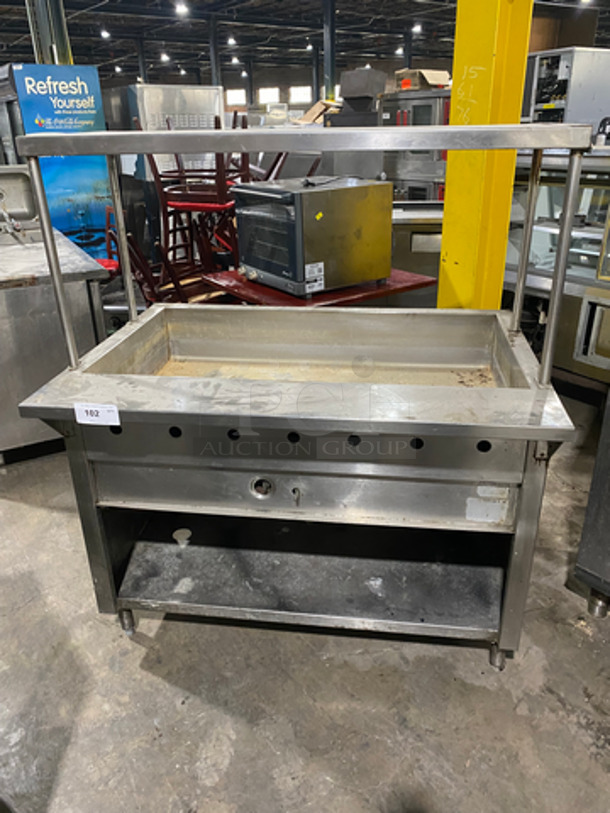Commercial Gas Powered Heated Serving Station! With Overhead Shelf! With Storage Space Underneath! All Stainless Steel! On Legs!