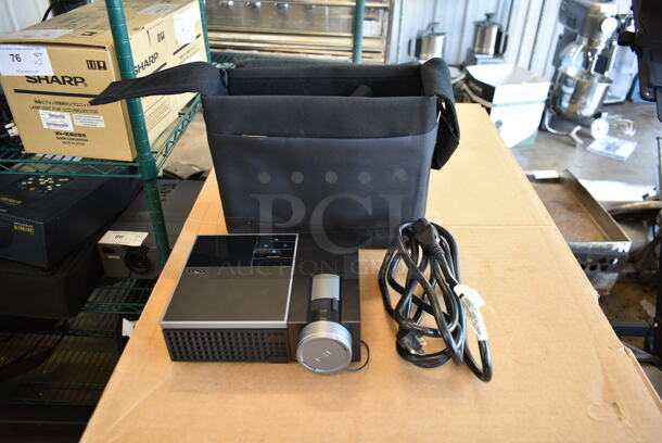 Dell M209X DLP Front Projector in Bag. 100-240 Volts, 1 Phase. 