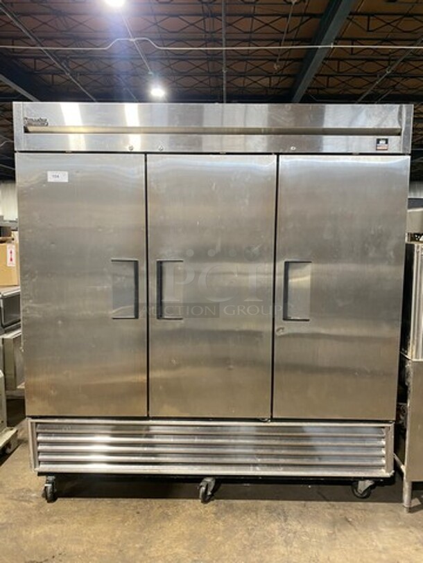 True Commercial 3 Door Reach In Freezer! With Poly Coated Racks! All Stainless Steel! Model TS72F Serial 13127275! 115/208/230V 1Phase! On Casters! WORKING WHEN REMOVED!