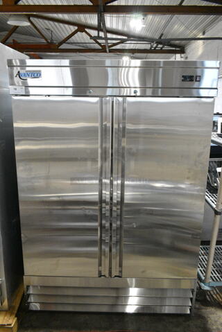 BRAND NEW SCRATCH AND DENT! 2024 Avantco 178SS2FHC Stainless Steel Commercial 2 Door Reach In Cooler w/ Poly Coated Racks. 115 Volts, 1 Phase.