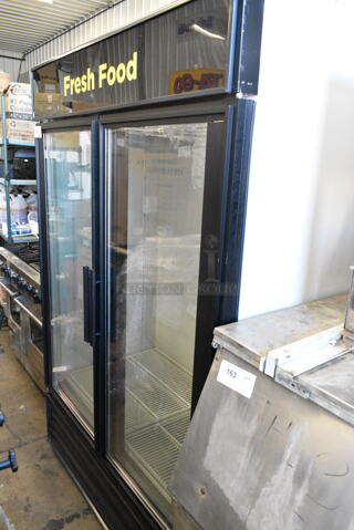 True GDM-49 Metal Commercial 2 Door Reach In Cooler Merchandiser w/ Poly Coated Racks. 115 Volts, 1 Phase. 