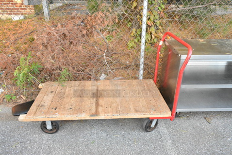 Red Metal Flat Cart on Commercial Casters. 