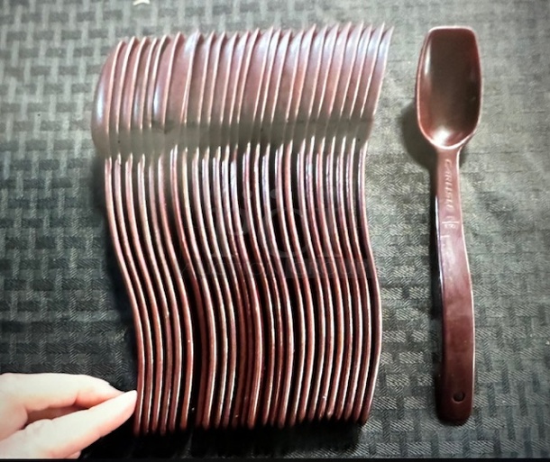 One Lot Of App 26 Poly Spoons.