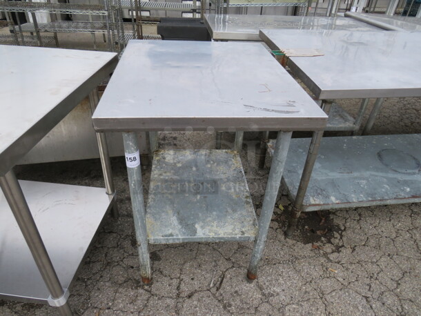 One Stainless Steel Table With Under Shelf. 30X24X34