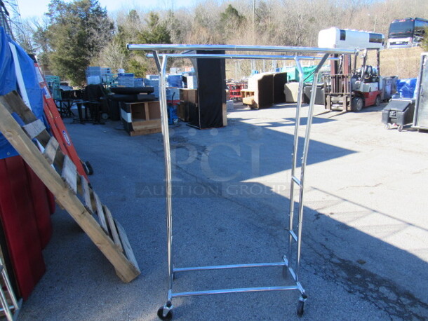 One Clothes Rack On Casters. 43X23X62
