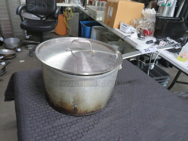 One Aluminum Sauce Pan With A Stainless Steel Lid. 10.5X7