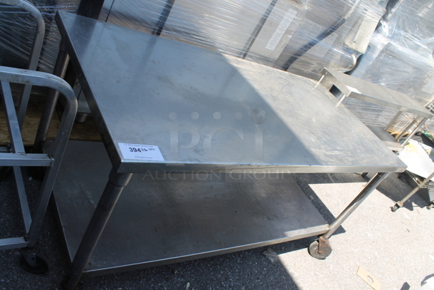 Stainless Steel Table w/ Under Shelf on Commercial Casters. 