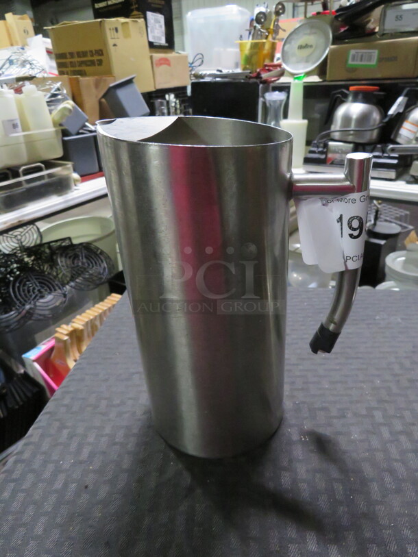 One Stainless Steel Beverage Pitcher.