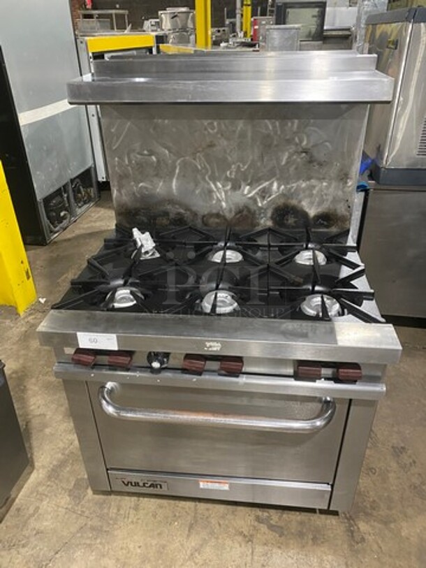 SWEET! Vulcan  Commercial Natural Gas Powered 6 Burner Range! With Full Size Oven Underneath! With Raised Backsplash And Salamander Shelf! All Stainless Steel! On Legs! Model: V36 SN: 481692940