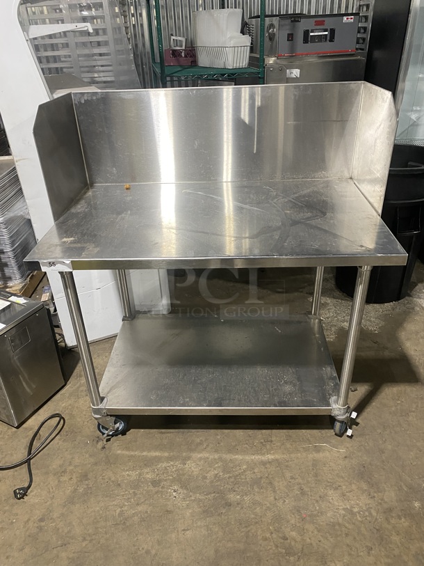 Like New! All Stainless Steel Heavy Duty Commercial Work/Prep Table! With Raised Back & Side Splashes! With Underneath Storage Space! On Casters!